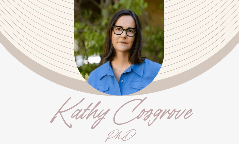 A woman wearing glasses and a blue shirt.